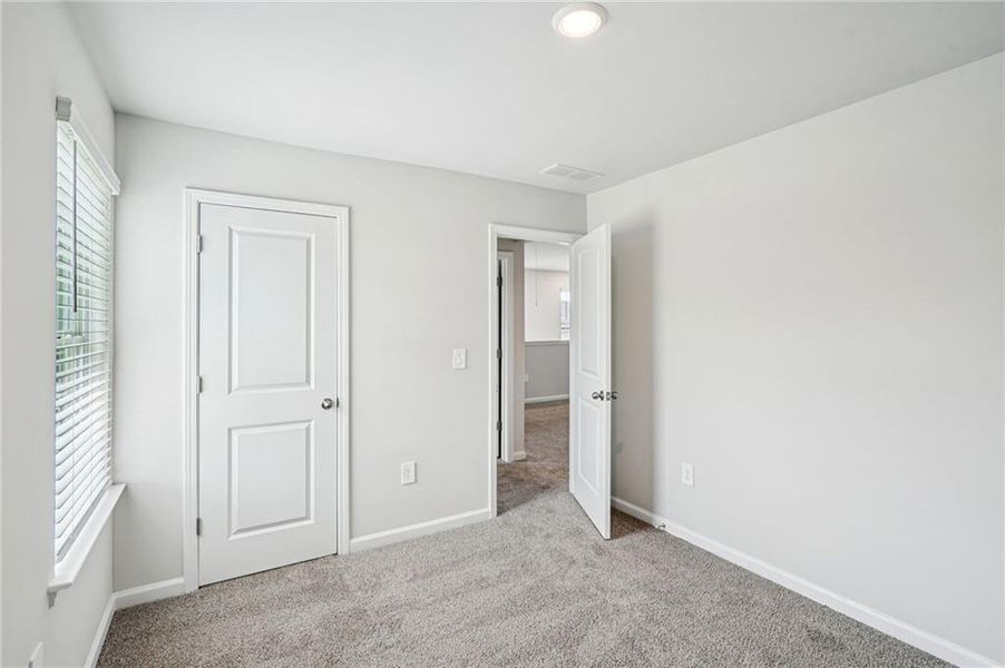 Spacious, unfurnished interior of a new home in Avalon - Reserve Series, Conyers (Image 21).