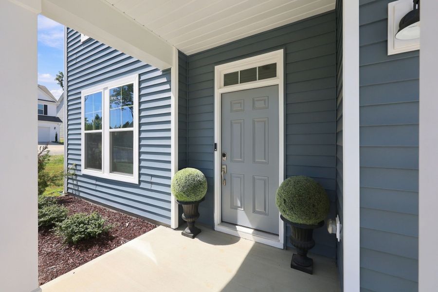 Exterior details and patio area of a home in Neill's Pointe, Angier (Image 2). Exterior details and patio area of a home in Neill's Pointe, Angier (Image 2).