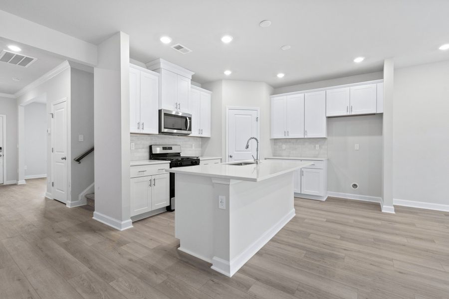 Furnished interior view inside a new home in Waterside - Coastline Series, Longs (Image 5).