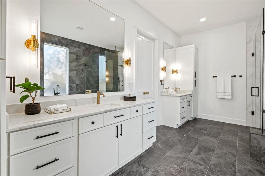 Bathroom featuring vanity and walk in shower