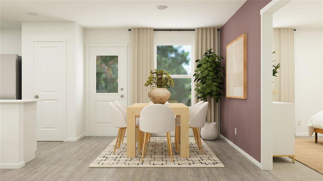 Dining area featuring light wood-type flooring