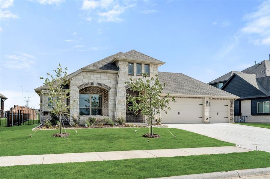 Front exterior of a new home in Silo Mills Classic 70, Joshua, TX, highlighting curb appeal (Image 2). Front exterior of a new home in Silo Mills Classic 70, Joshua, TX, highlighting curb appeal (Image 2).