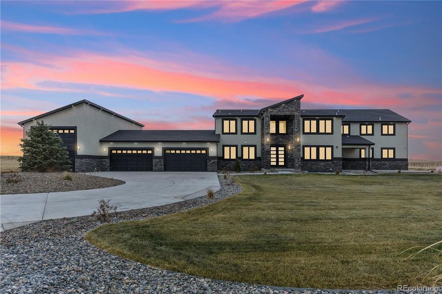 Front exterior of a new home in , Hudson, CO, highlighting curb appeal (Image 25).