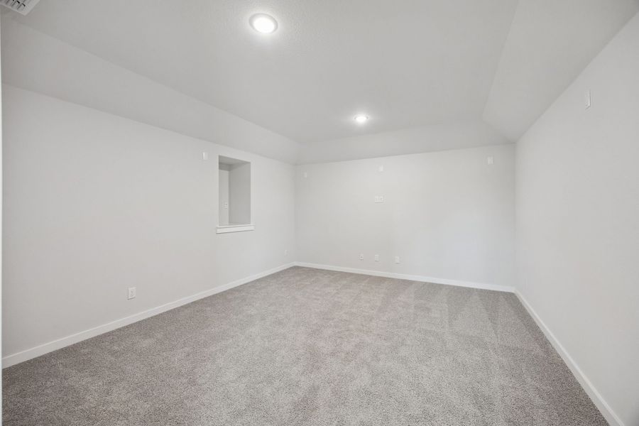 Media Room in the Masters home plan by Trophy Signature Homes – REPRESENTATIVE PHOTO