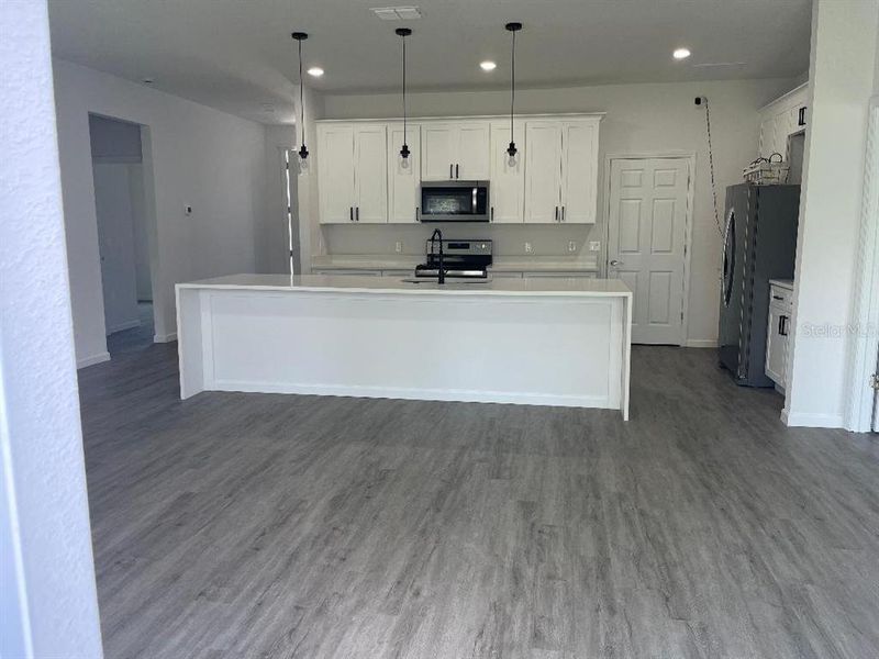 Furnished interior view inside a new home in , Kissimmee (Image 11). Furnished interior view inside a new home in , Kissimmee (Image 11).