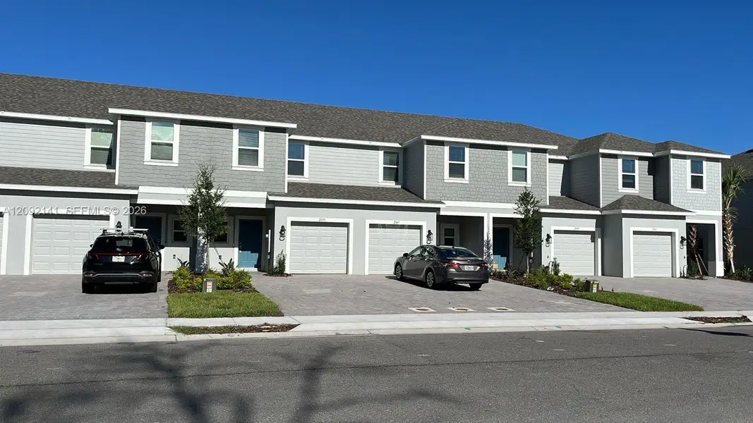 Front exterior of a new home in , Davenport, FL, highlighting curb appeal (Image 1). Front exterior of a new home in , Davenport, FL, highlighting curb appeal (Image 1).
