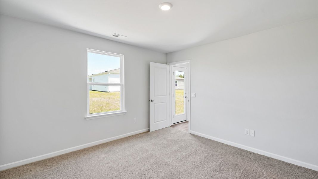 Spacious, unfurnished interior of a new home in Lockwood Landing, Supply (Image 24).