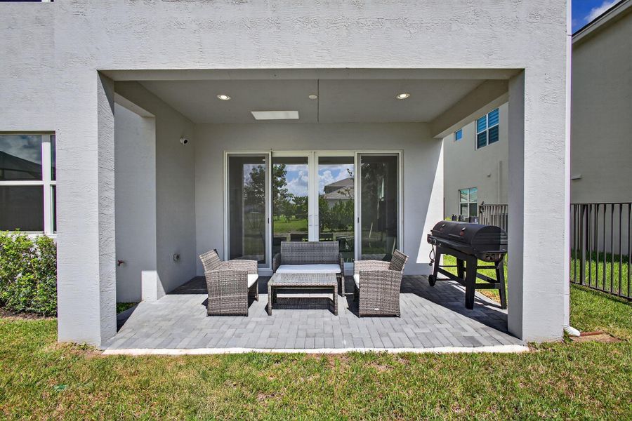 Front exterior of a new home in , The Acreage, FL, highlighting curb appeal (Image 32).