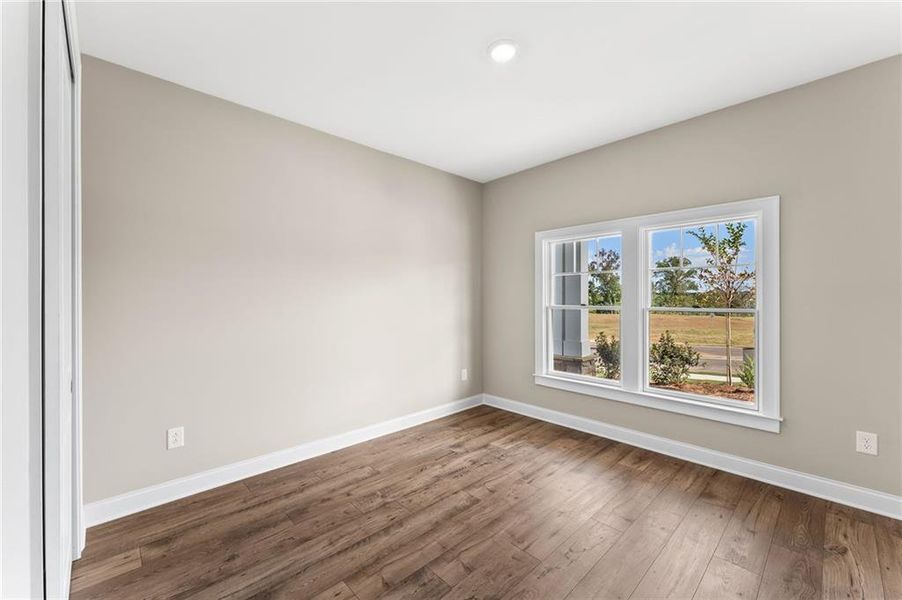 Spacious, unfurnished interior of a new home in The Courtyards at Post Road, Cumming (Image 17).