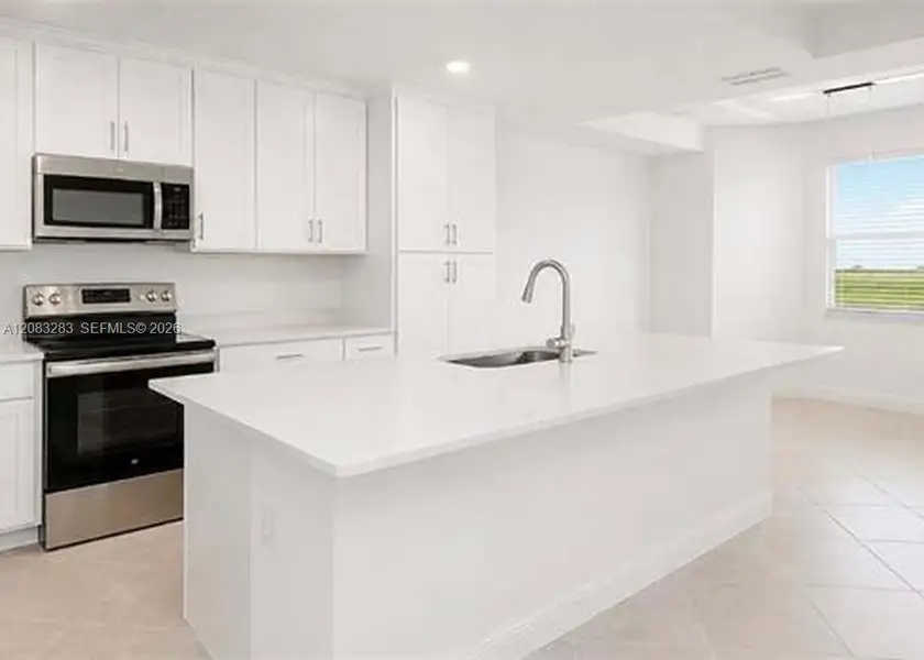 Furnished interior view inside a new home in , Ave Maria (Image 7).
