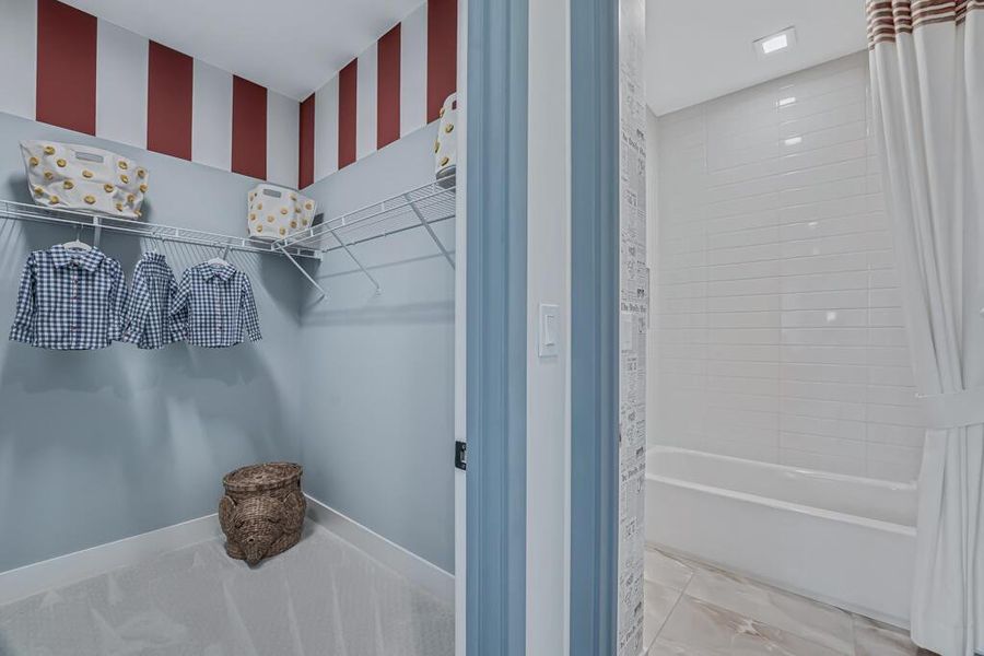 Furnished interior view inside a new home in Apex at Avenir, Palm Beach Gardens (Image 91).