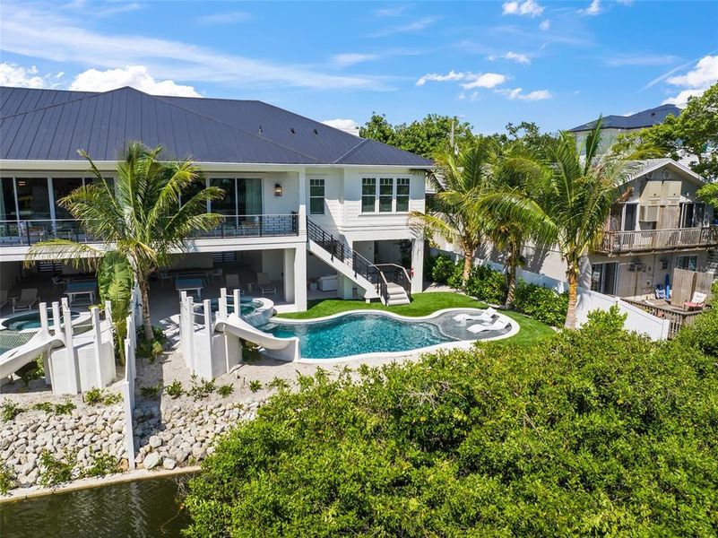 Front exterior of a new home in , Sarasota, FL, highlighting curb appeal (Image 20).