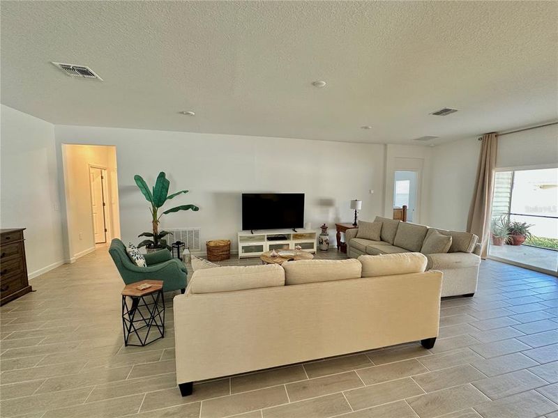 Furnished interior view inside a new home in Pioneer Ranch, Ocala (Image 16).