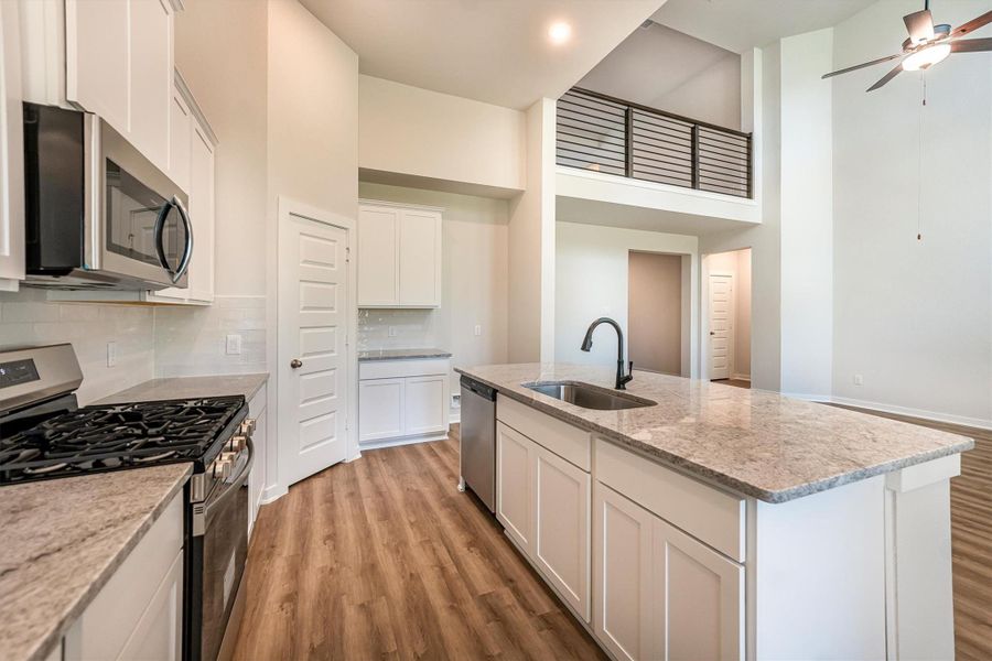 Furnished interior view inside a new home in Deer Pines, Conroe (Image 12).