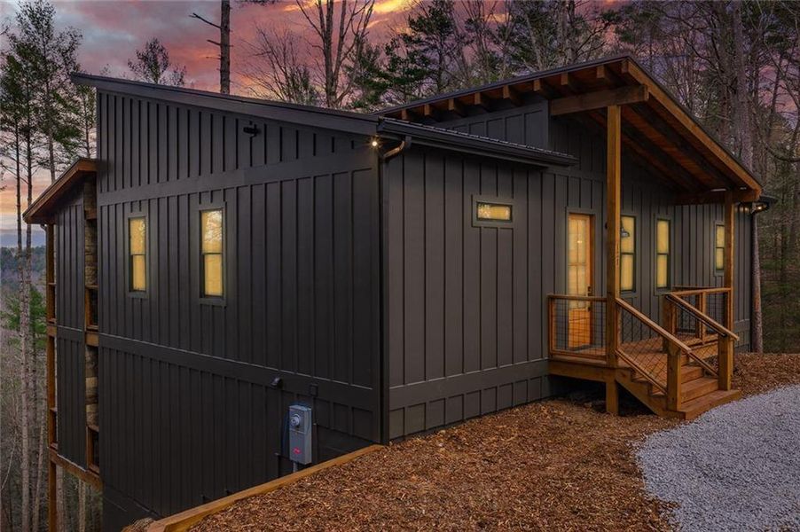 Exterior details and patio area of a home in , Ellijay (Image 16).