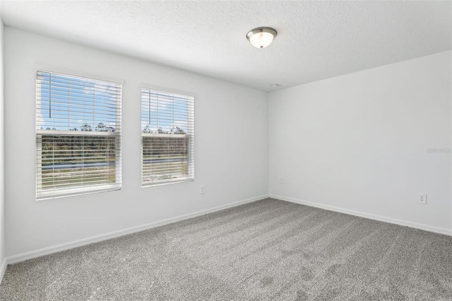 Spacious, unfurnished interior of a new home in Lake Deer Estates - Signature Series, Poinciana (Image 33). Spacious, unfurnished interior of a new home in Lake Deer Estates - Signature Series, Poinciana (Image 33).