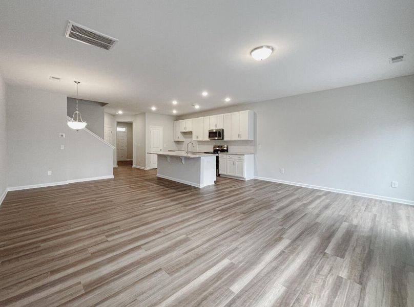 Spacious, unfurnished interior of a new home in East Main Townes, Spartanburg (Image 18).