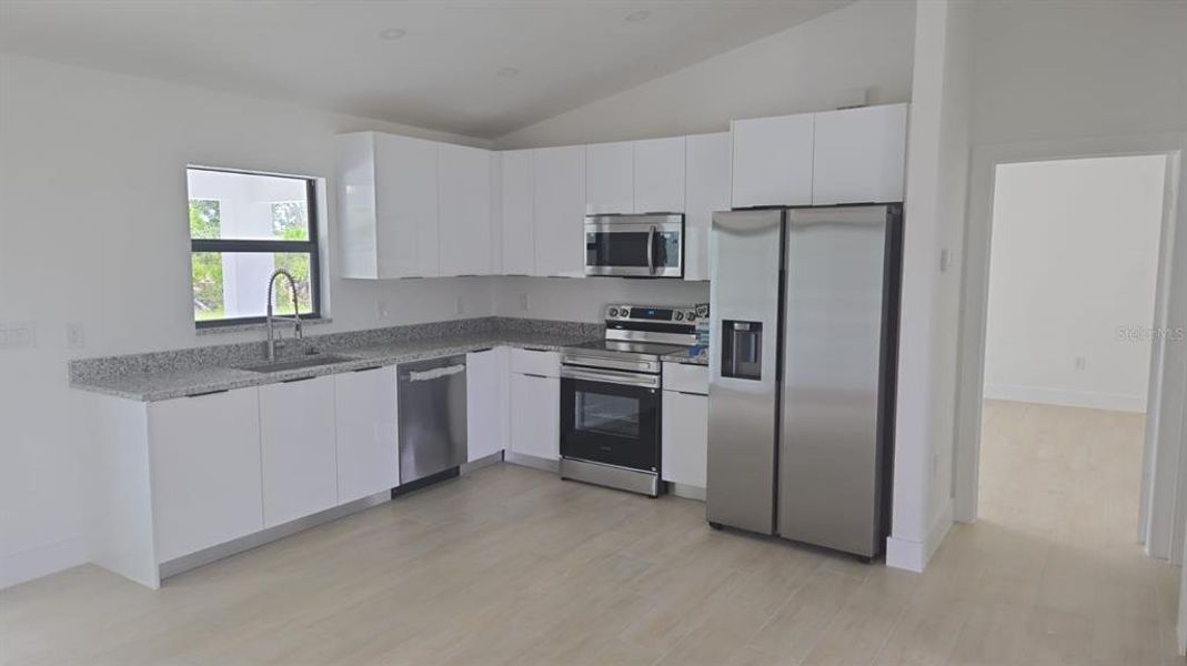 Furnished interior view inside a new home in , Port Charlotte (Image 3).