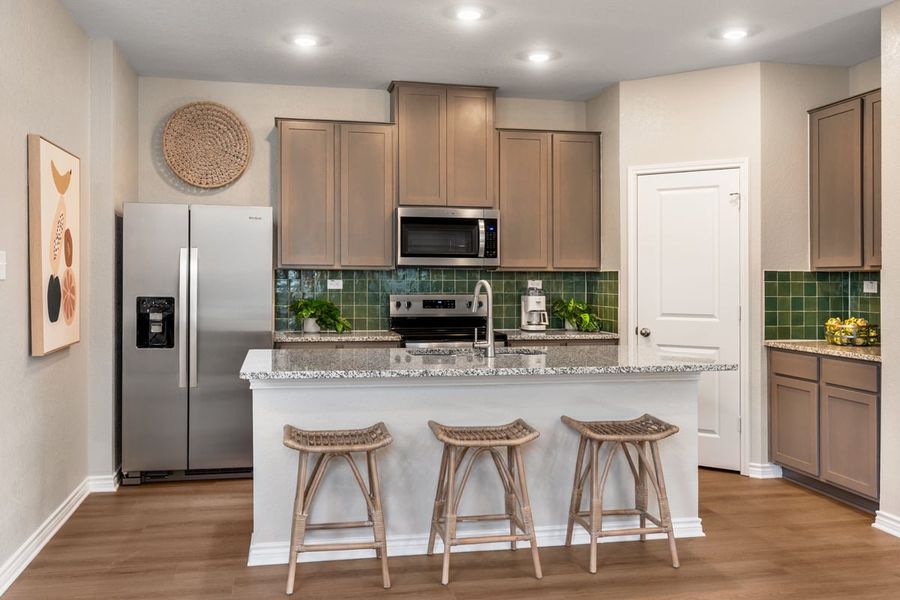 Representative furnished interior of a home built from the Plan 1605 Modeled by KB Home in Woodside Farms, Seguin (Image 5).