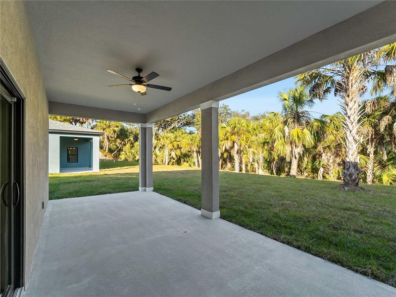 Exterior details and patio area of a home in , North Port (Image 38).