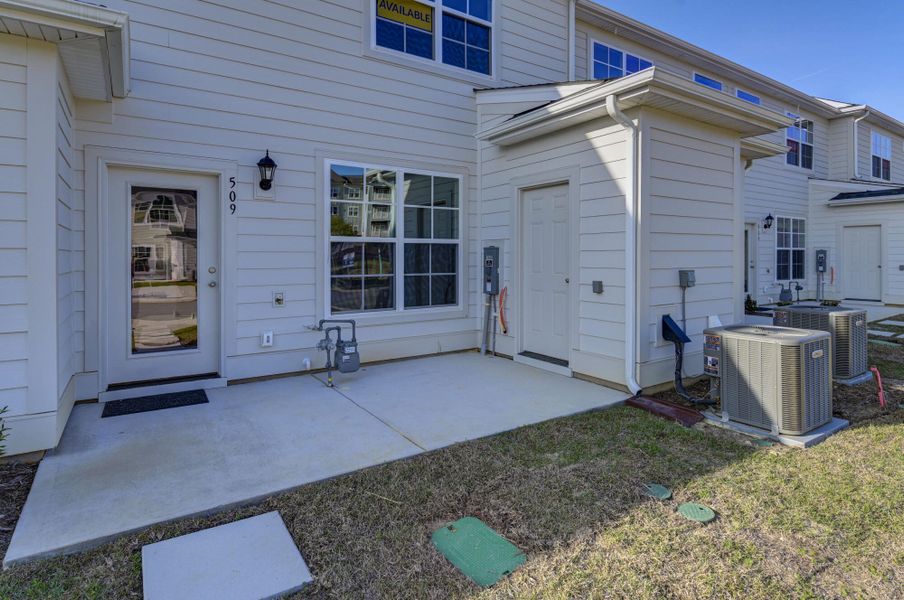 Exterior details and patio area of a home in Lake Carolina Townhomes, Columbia (Image 27).