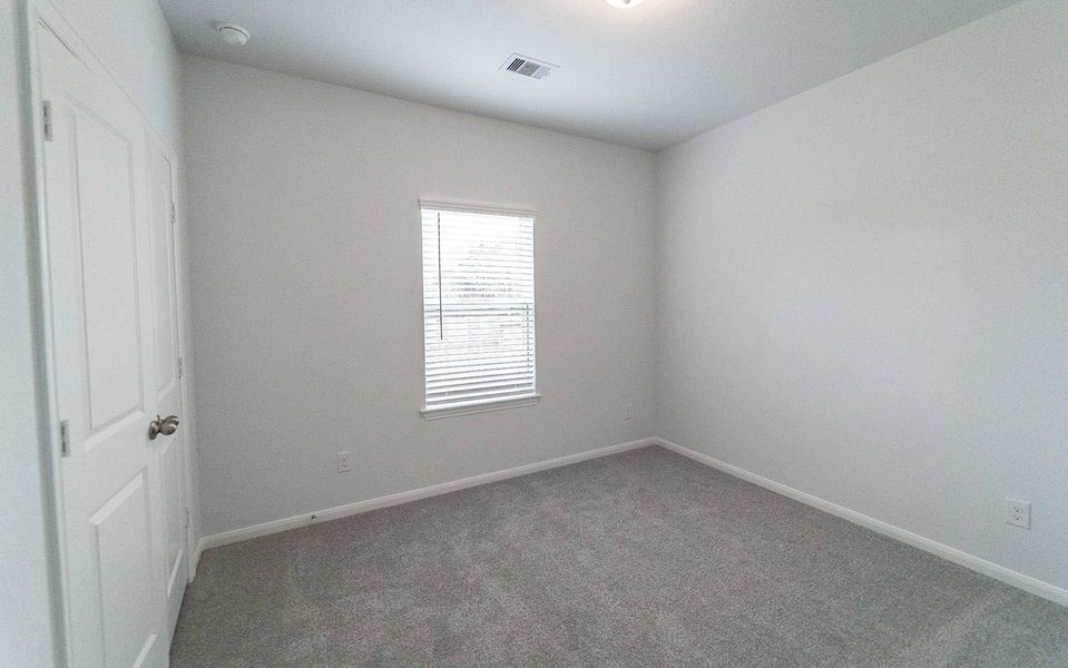 Spacious, unfurnished interior of a new home in Windrose Green, Angleton (Image 11).