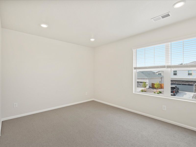 Spacious, unfurnished interior of a new home in Buffalo Highlands: The Flora Collection, Commerce City (Image 13).