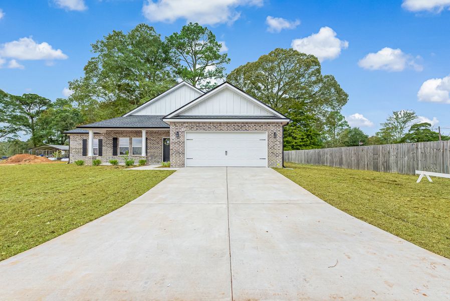 Front exterior of a new home in Barton's Bend, Crestview, FL, highlighting curb appeal (Image 30). Front exterior of a new home in Barton's Bend, Crestview, FL, highlighting curb appeal (Image 30).