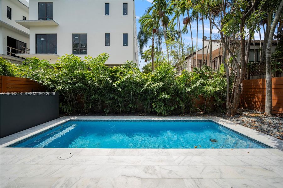 Exterior details and patio area of a home in , Miami (Image 28). Exterior details and patio area of a home in , Miami (Image 28).