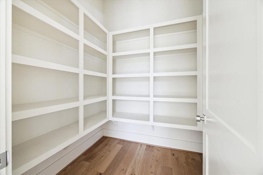 Well Planned - This walk-in pantry is designed to organize your kitchen wears, groceries and appliances. U-shaped surround shelving delivers plenty of storage. It comes with the Option to upgrade to cabinets and counters for kitchen appliances.