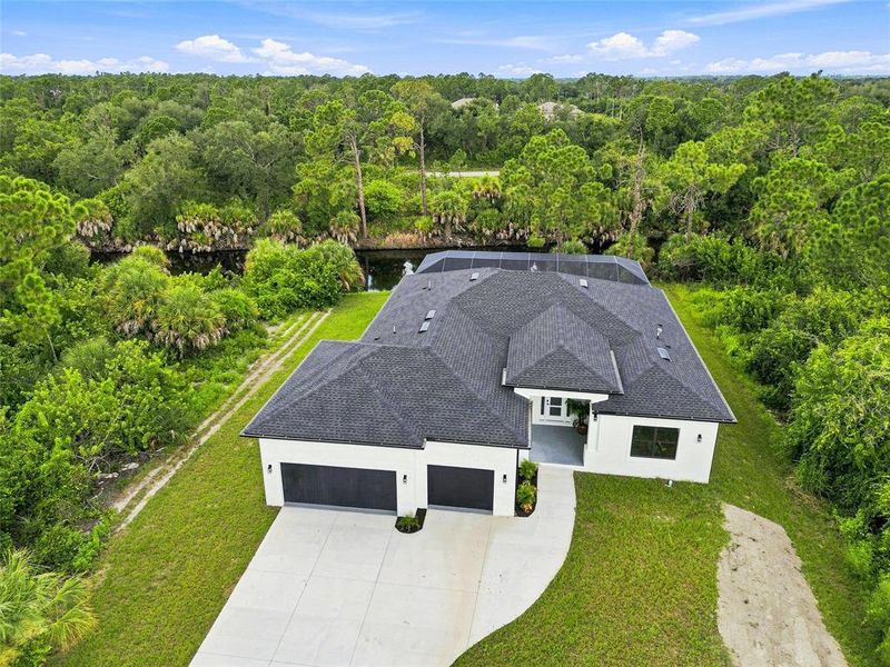 Front exterior of a new home in , Port Charlotte, FL, highlighting curb appeal (Image 31). Front exterior of a new home in , Port Charlotte, FL, highlighting curb appeal (Image 31).