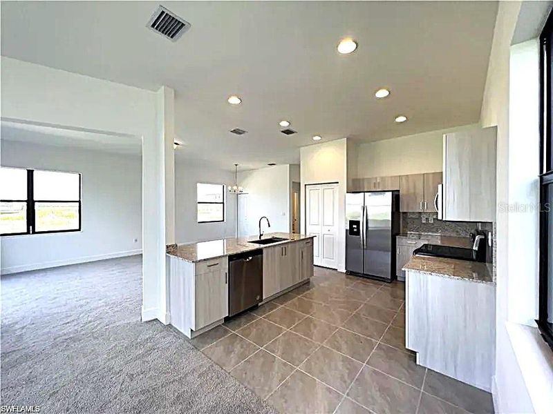 Furnished interior view inside a new home in , Ave Maria (Image 9).