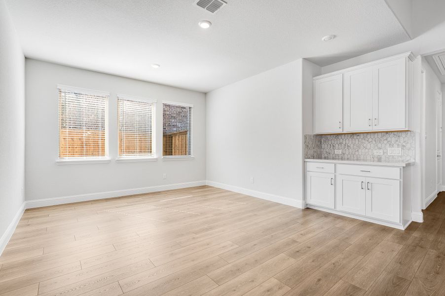 Representative unfurnished interior of a home built from the Jade by Taylor Morrison in South Oak 60s, Oak Point (Image 9).
