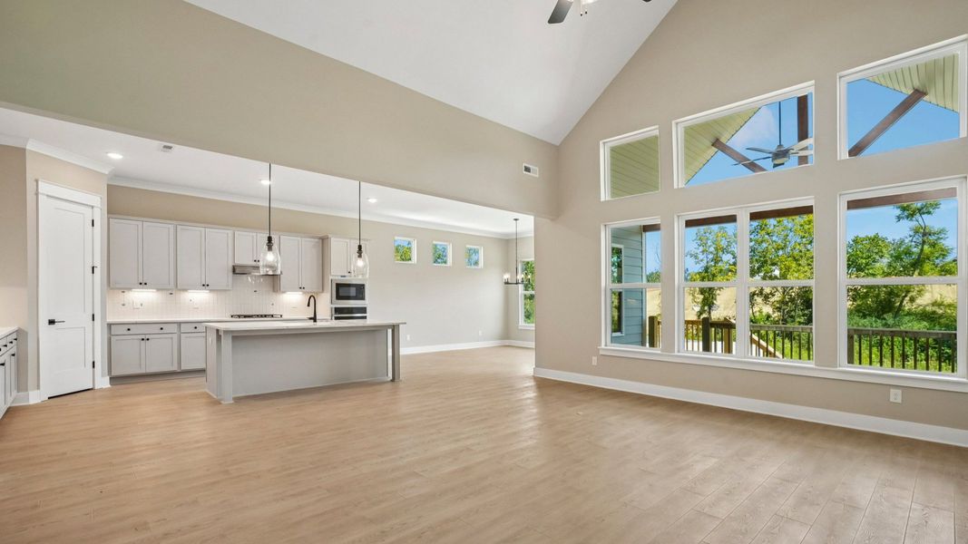 Spacious living space with kitchen and dining areas
