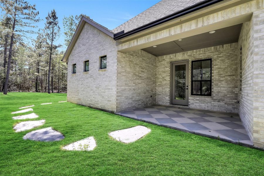 Private patio outside primary bedroom