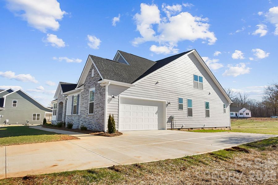 Front exterior of a new home in Lancaster Hwy, Waxhaw, NC, highlighting curb appeal (Image 23).