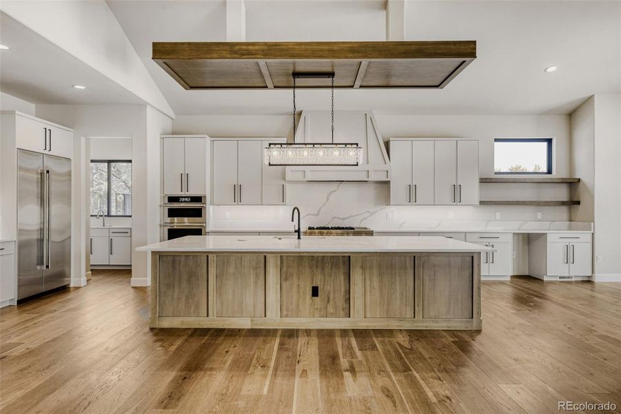 Kitchen with custom ceiling treatment