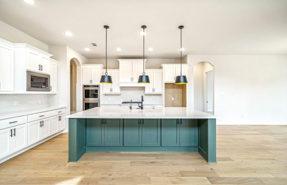 Furnished interior view inside a new home in Bridgeland 60′, Cypress (Image 12).