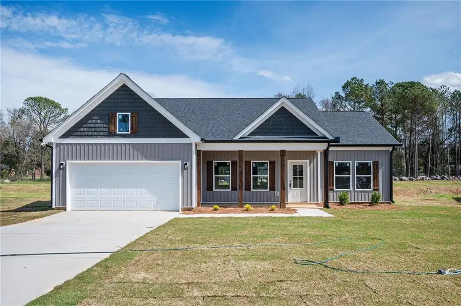 Front exterior of a new home in , Mount Zion, GA, highlighting curb appeal (Image 13). Front exterior of a new home in , Mount Zion, GA, highlighting curb appeal (Image 13).
