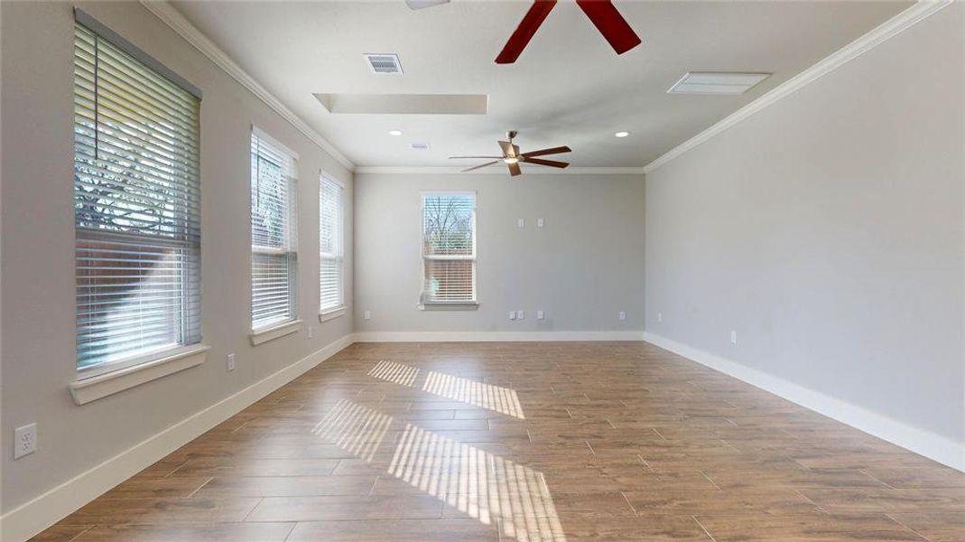 View of the living and dining areas taken from the kitchen.