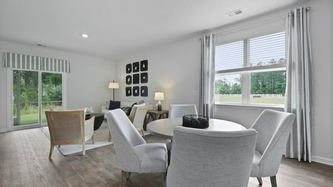 Furnished interior view inside a new home in Pine Hills at Cane Bay, Summerville (Image 8). Furnished interior view inside a new home in Pine Hills at Cane Bay, Summerville (Image 8).