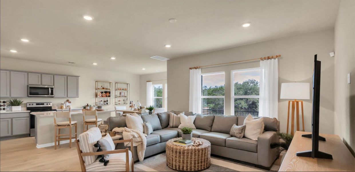 Living room featuring recessed lighting and light wood finished floors