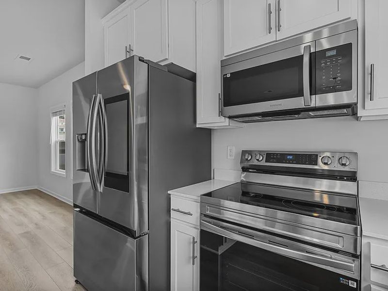 Furnished interior view inside a new home in Percival Village, Columbia (Image 4).