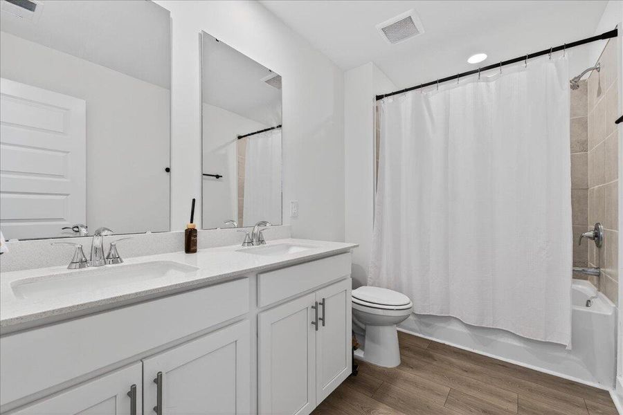 Furnished interior view inside a new home in The Coves at Lakes of Cane Bay, Summerville (Image 22). Furnished interior view inside a new home in The Coves at Lakes of Cane Bay, Summerville (Image 22).