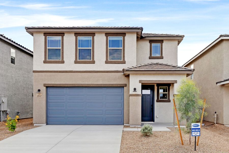 Front exterior of a new home in Blackhawk, Tucson, AZ, highlighting curb appeal (Image 1). Front exterior of a new home in Blackhawk, Tucson, AZ, highlighting curb appeal (Image 1).