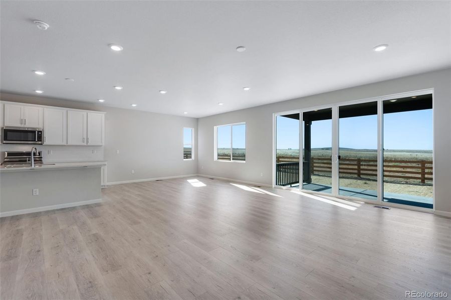 Spacious, unfurnished interior of a new home in Reunion Ridge, Commerce City (Image 18).