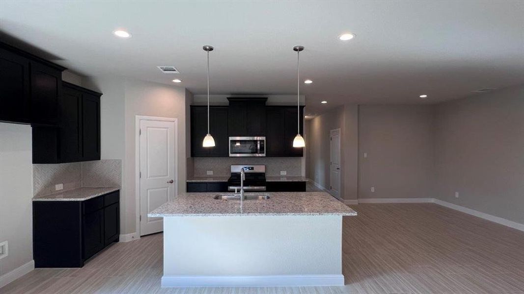 Kitchen- All Home and community information, including pricing, included features, terms, availability and amenities, are subject to change at any time without notice or obligation. All Drawings, pictures, photographs, video, square footages, floor plans, elevations, features, colors and sizes are approximate for illustration purposes only and will vary from the homes as built.