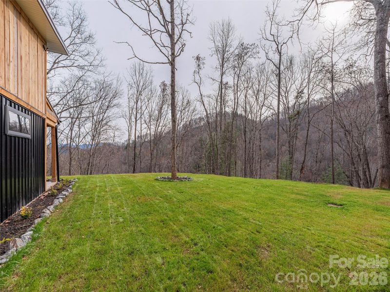 Exterior details and patio area of a home in , Waynesville (Image 21).