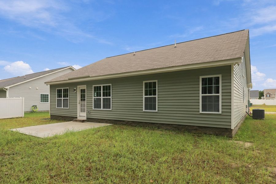 Exterior details and patio area of a home in Davenport Farms, Winterville (Image 3).