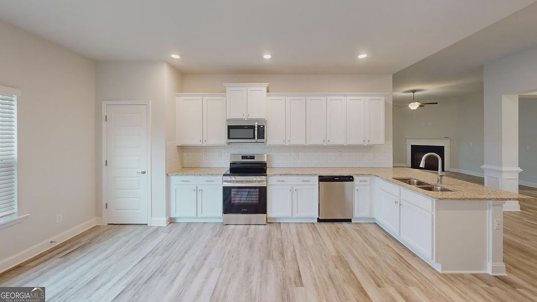 Furnished interior view inside a new home in Holliday Pass, Griffin (Image 6).